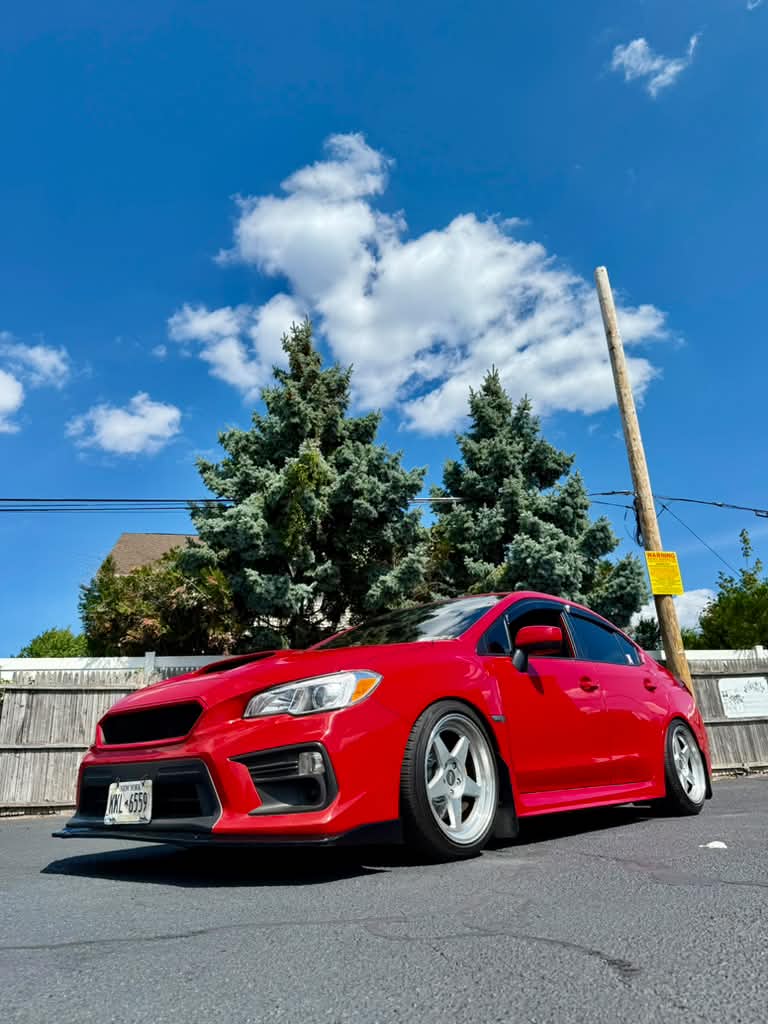A customer car built by Phenomenal Autowerkz, aired out and sitting low